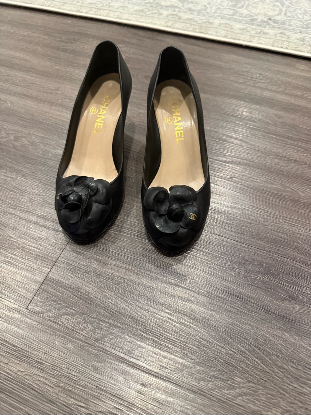 CHANEL Black Leather Camellia Ballet Flats